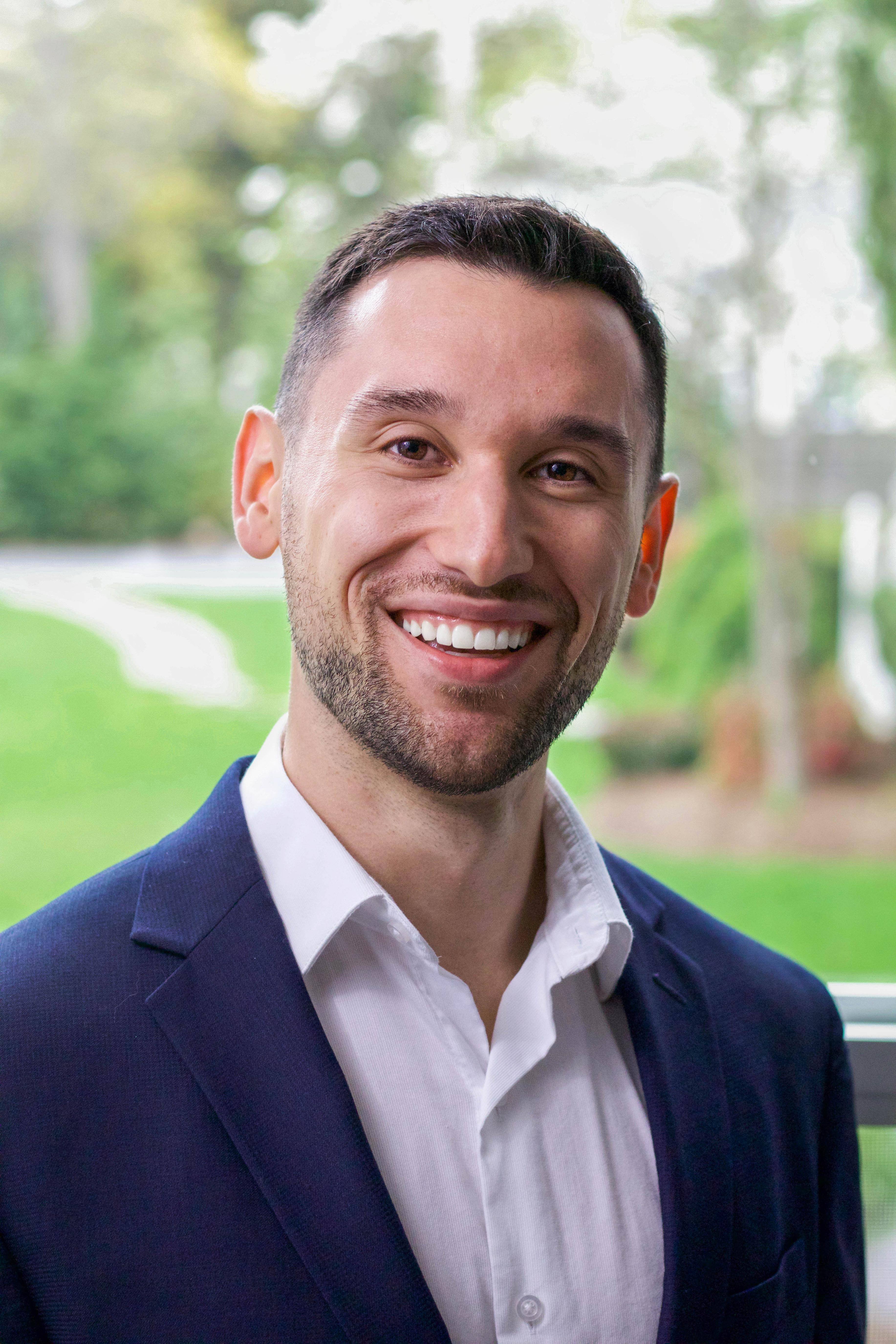 Dr. Alex Eckert, D.C. — founder of Oak & Olive Chiropractic